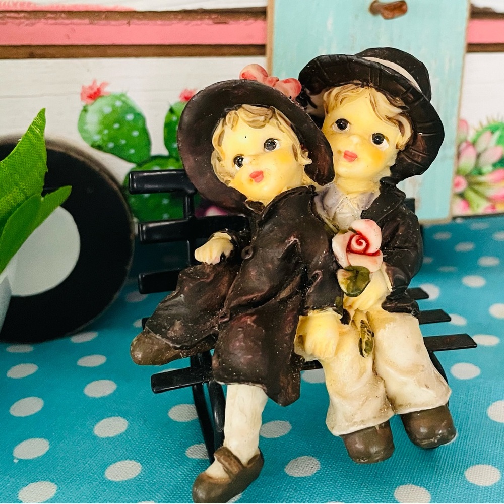 Vintage Figurine with Black and Cream Accents